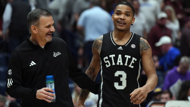 Mar 14, 2024; Nashville, TN, USA; Mississippi State Bulldogs head coach Chris Jans and Mississippi State Bulldogs guard Shakeel Moore (3) celebrate after a win against the LSU Tigers at Bridgestone Arena. Mandatory Credit: Christopher Hanewinckel-USA TODAY Sports